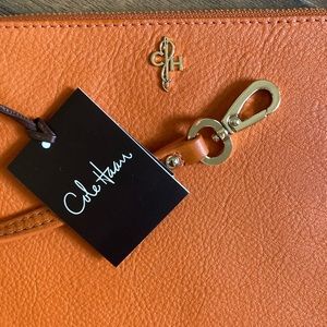 Cole Haan thin clutch, burnt Orange, new w/ tags